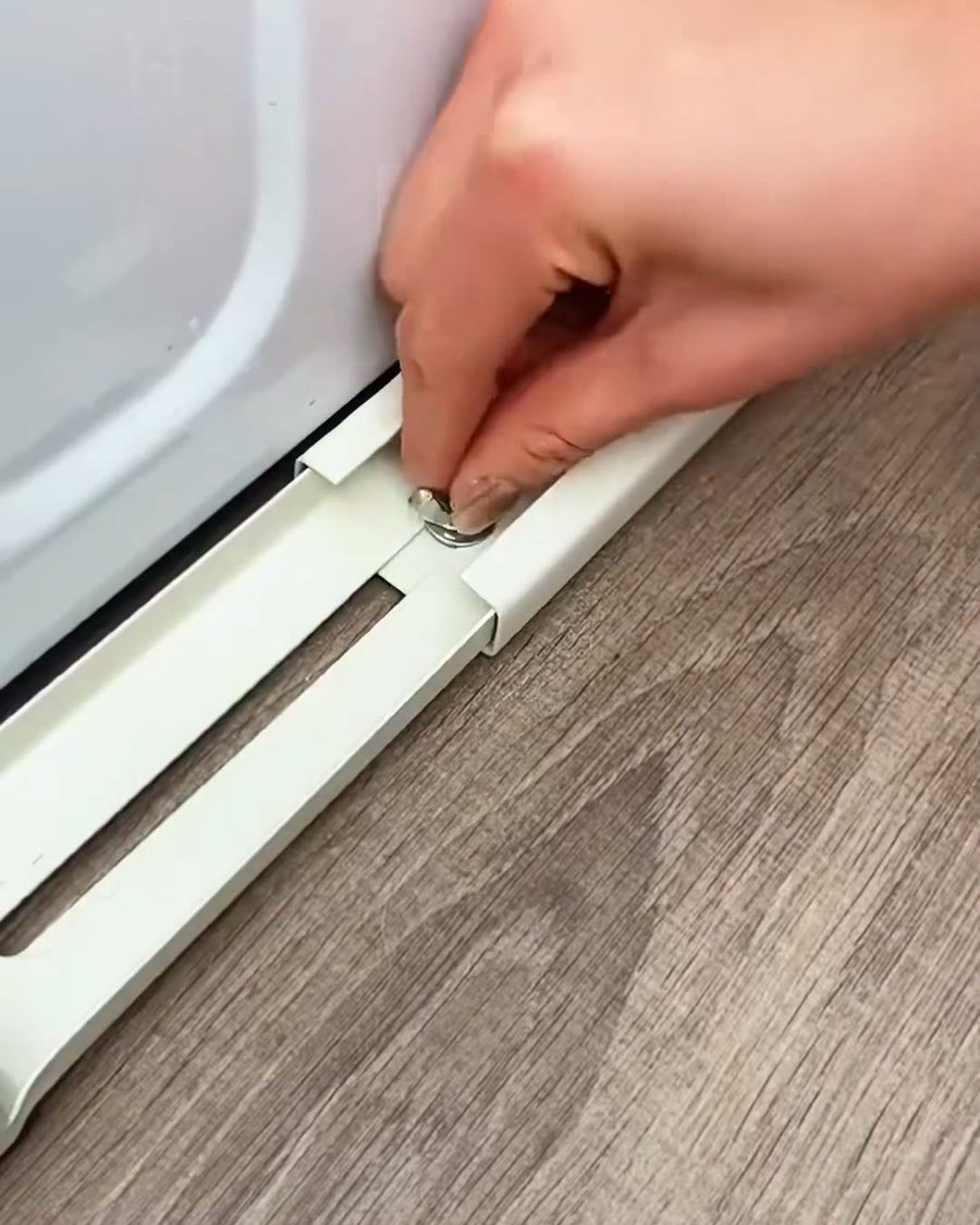 洗濯機の脚の下にレールを合わせる